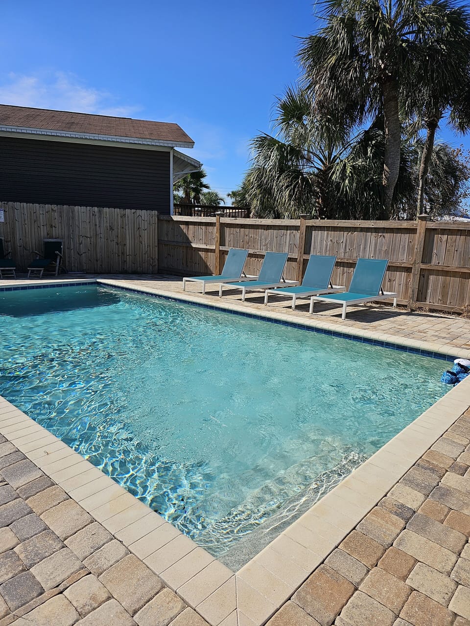 Beautiful pool shared by the three townhomes