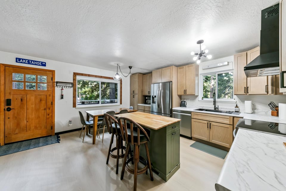 Spacious kitchen with cozy dining nook and natural light
