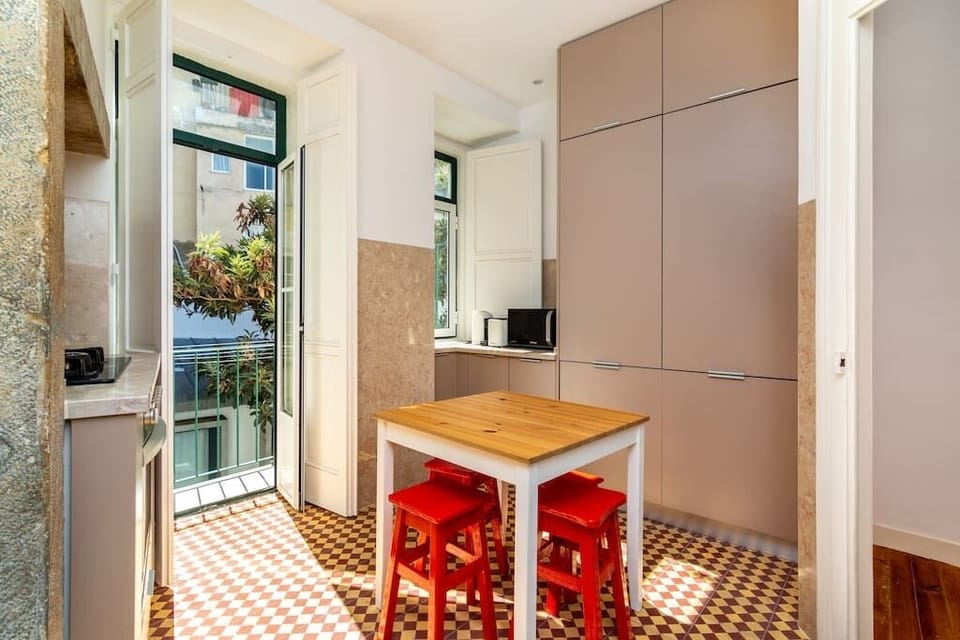 Large Kitchen with additional small dining table &amp; chairs and Key amenities (microwave, kettle, espresso machine, cooker and oven, Fridge Freezer)