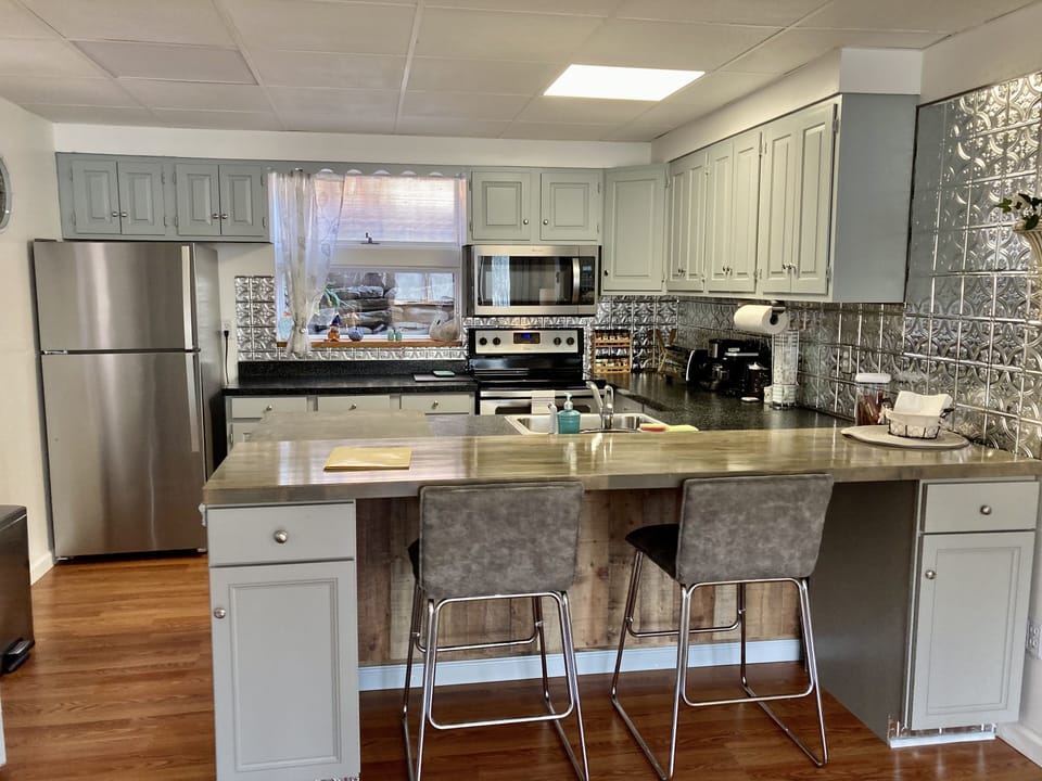 All new appliances, wide open kitchen with additional counter/bar stools