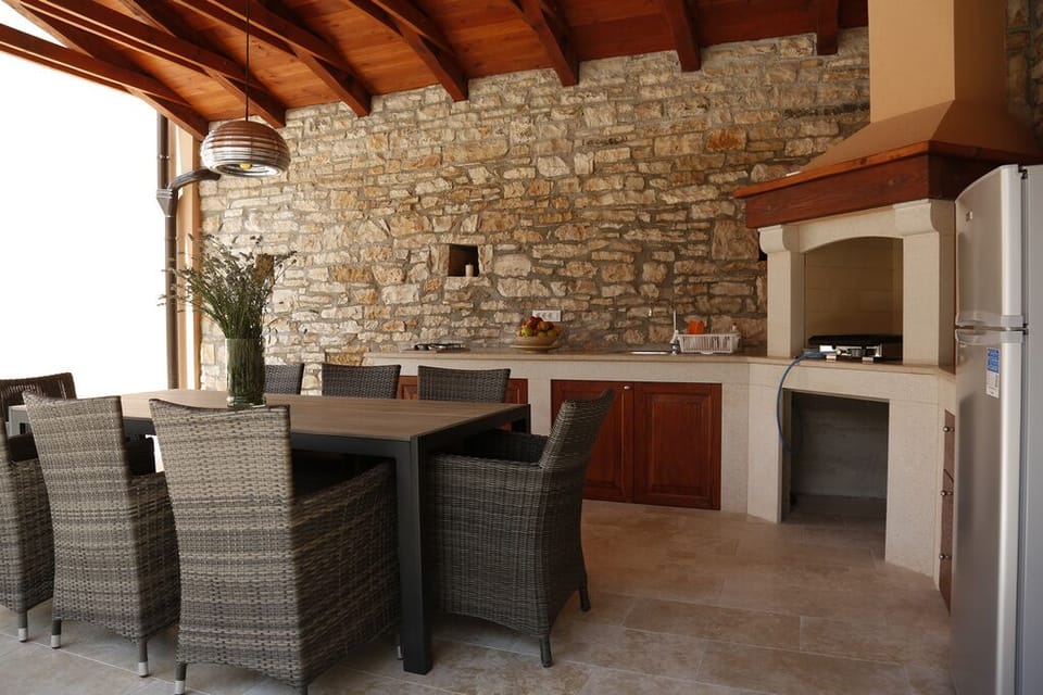 outdoor kitchen with fireplace