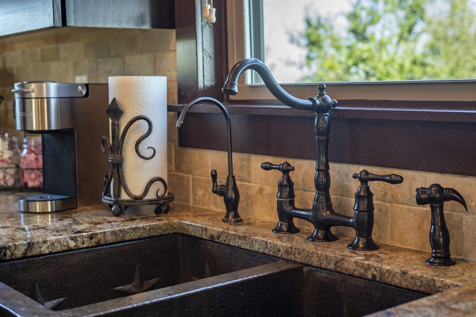 Beautiful copper sink with reverse osmosis filtering system; whole home filter.