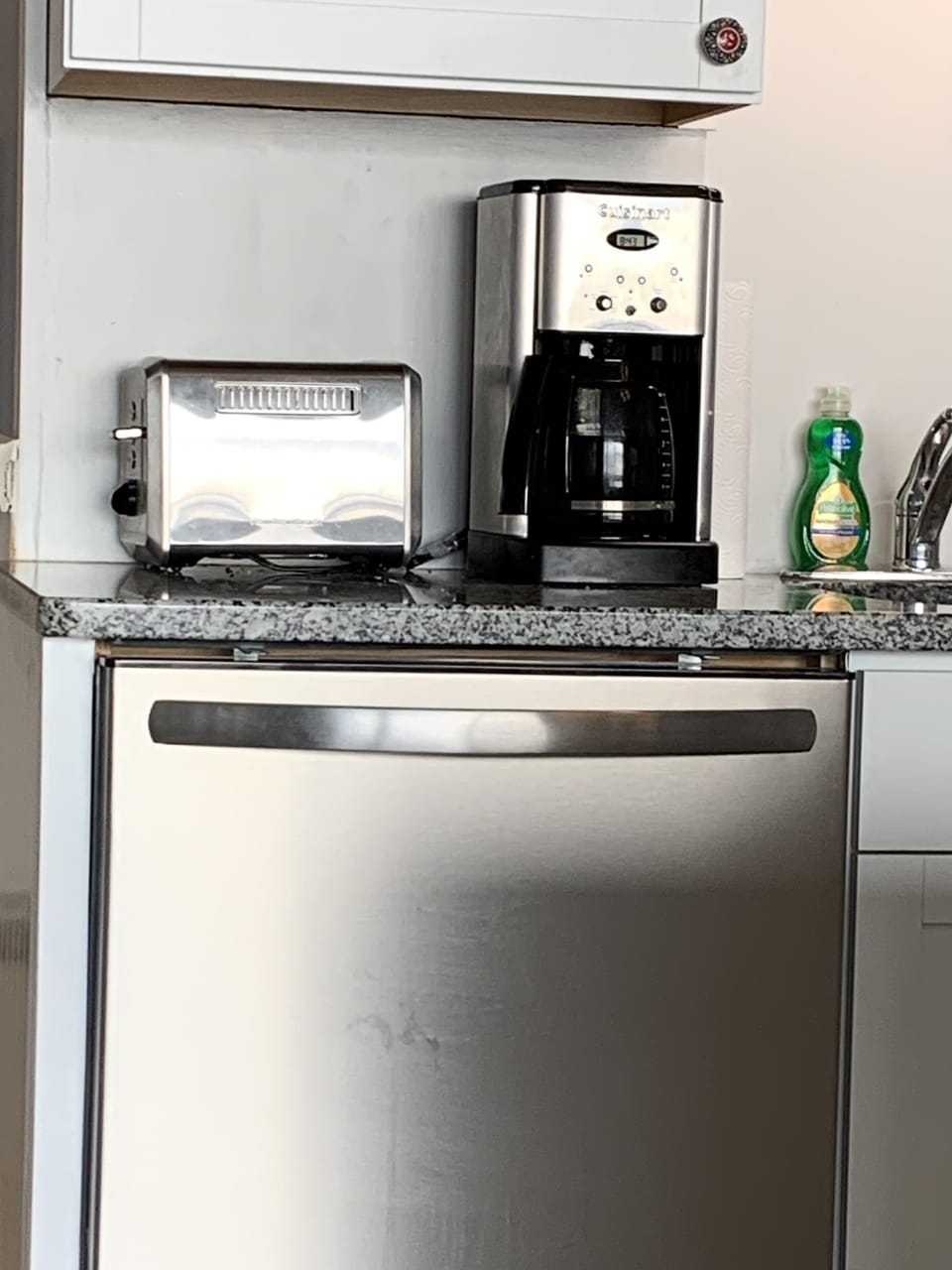 Full sized dishwasher; convenient toaster & Cuisinart coffee maker.