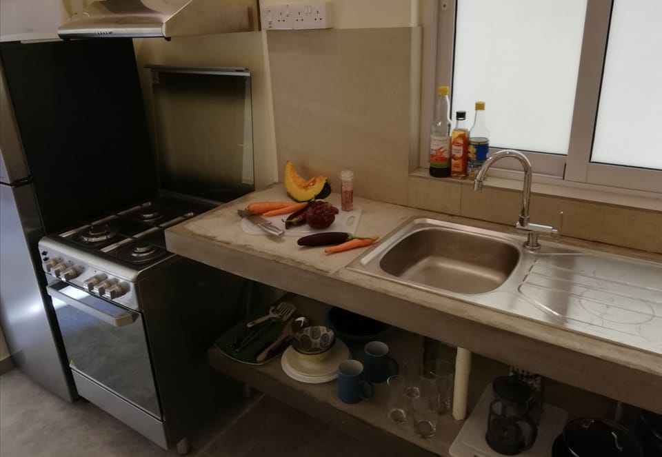 Private kitchen has Fridge freezer Gas hob and oven with basic kitchen equipment