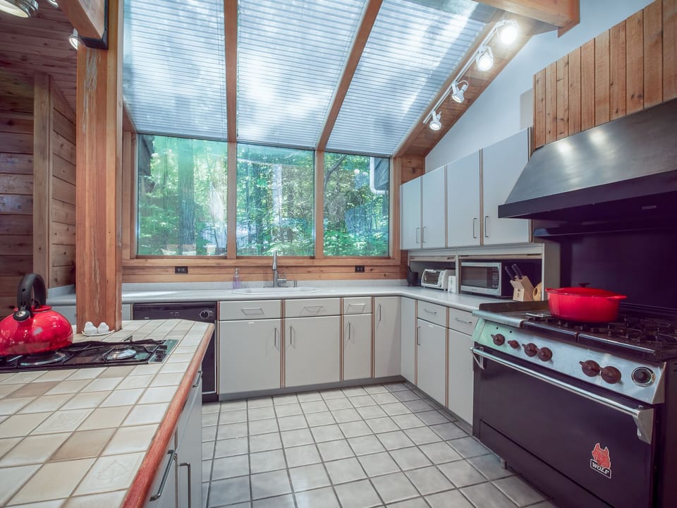 Enjoy our fully equipped kitchen with dishwasher, large stove, and fridge