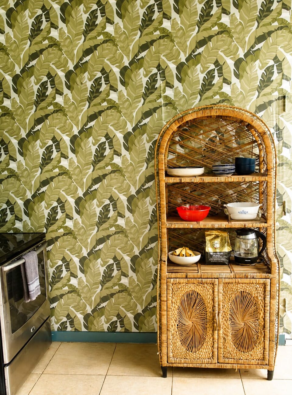 Wicker hutch holds dishes, pots, pans, and storage for food while on your stay!