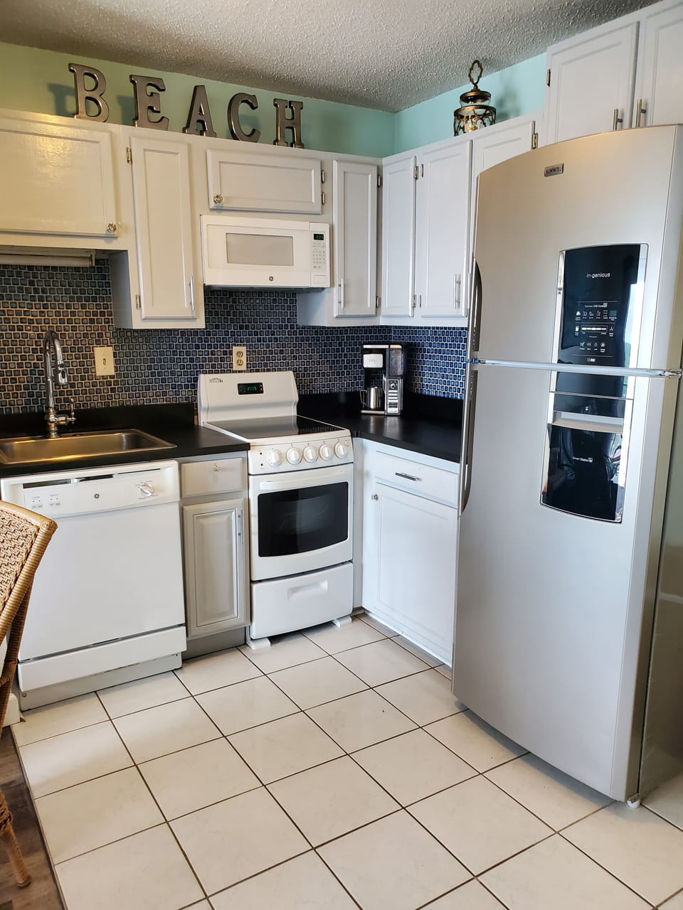 Modern kitchen with newer appliances plus all essentials! Ninja coffee bar