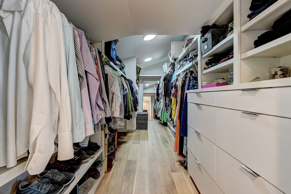 Upstairs primary bedroom closet