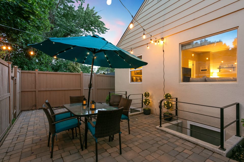 Elegant back patio shared with neighboring apartment.