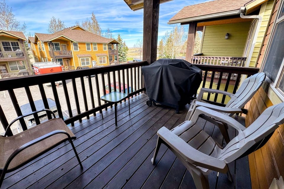 The second-floor balcony off the living room comes with a gas grill. 