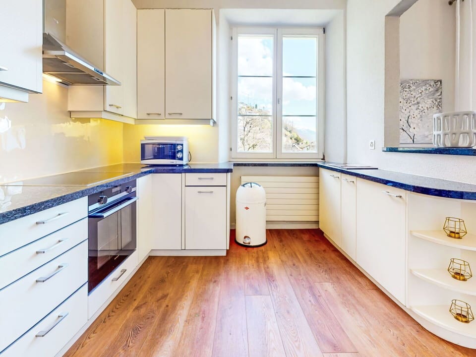 Flooring, Kitchen Appliance, Kitchen, Cabinetry, Countertop, Interior Design, Major Appliance, Wood, Floor, Furniture