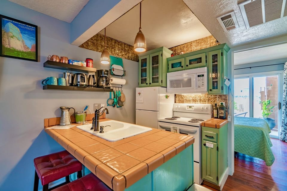 Cozy  kitchen is fully equipped  for cooking