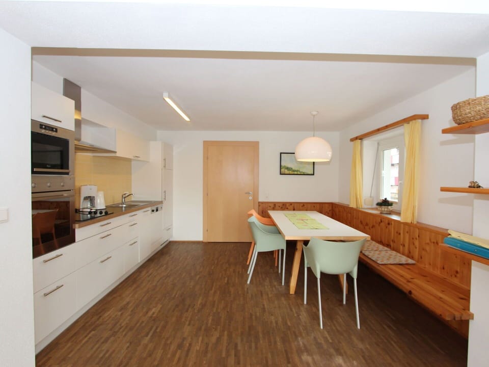 Furniture, Cabinetry, Building, Table, Countertop, Wood, Window, Flooring, Interior Design, Floor