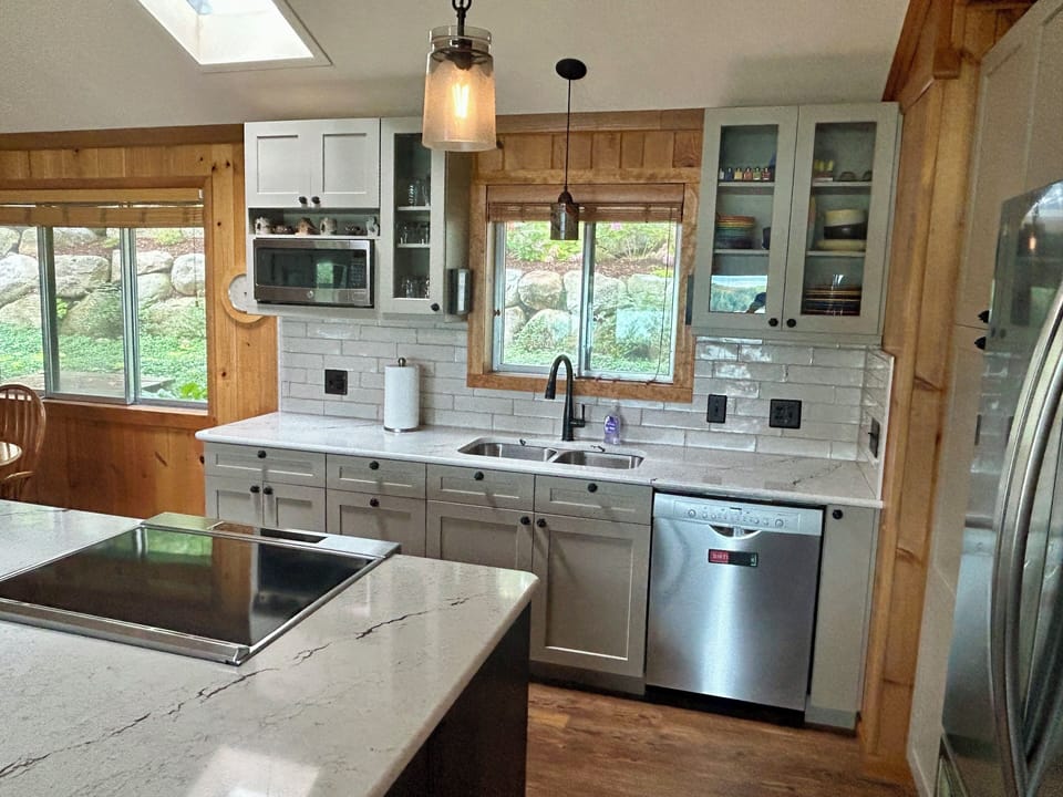 The newly renovated kitchen is modern, well-equipped and extremely user friendly