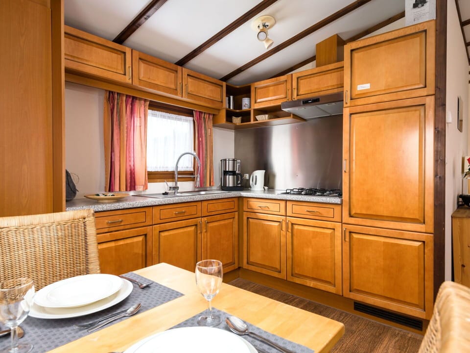 Cabinetry, Countertop, Property, Tap, Furniture, Sink, Kitchen, Wood, Kitchen Appliance, Plumbing Fixture