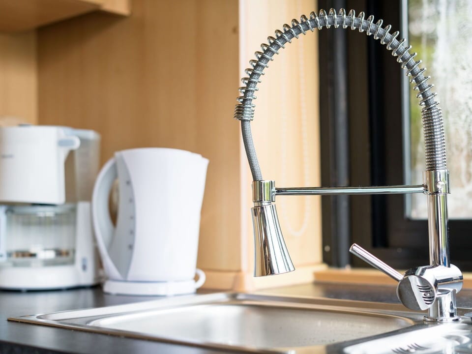 Property, Table, Drinkware, Cup, Tableware, Desk, Serveware, Kitchen Appliance, Wood, Kitchen