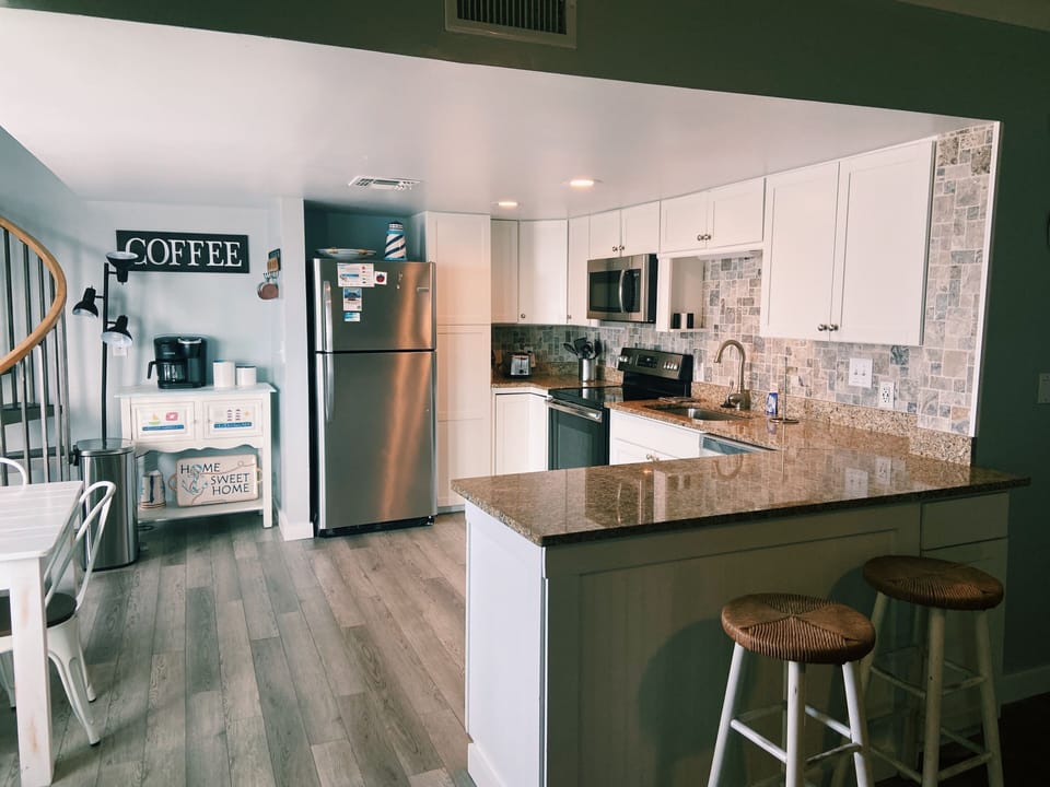 Fully equipped kitchen with added combo air fryer/toaster oven, crock pot etc. 