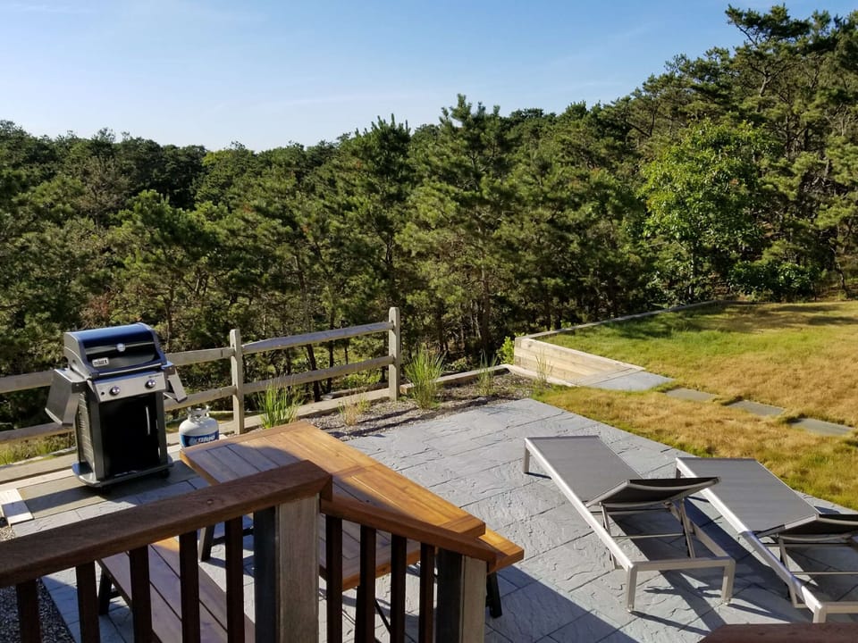 Patio with outdoor furniture and gas grill