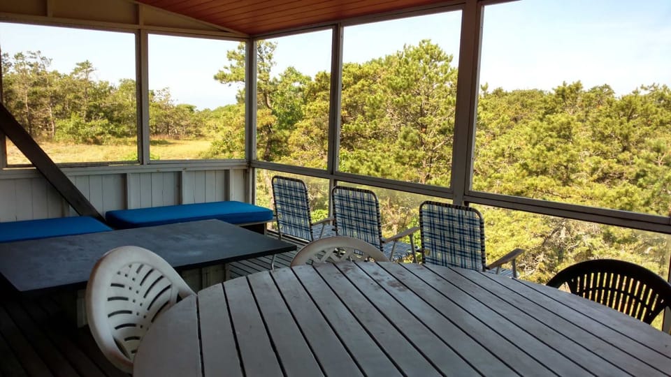 Screen porch on lower building