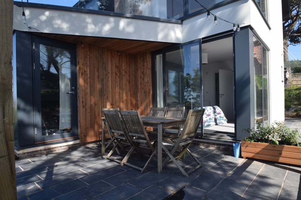Patio area with doors into living area and the master bedroom