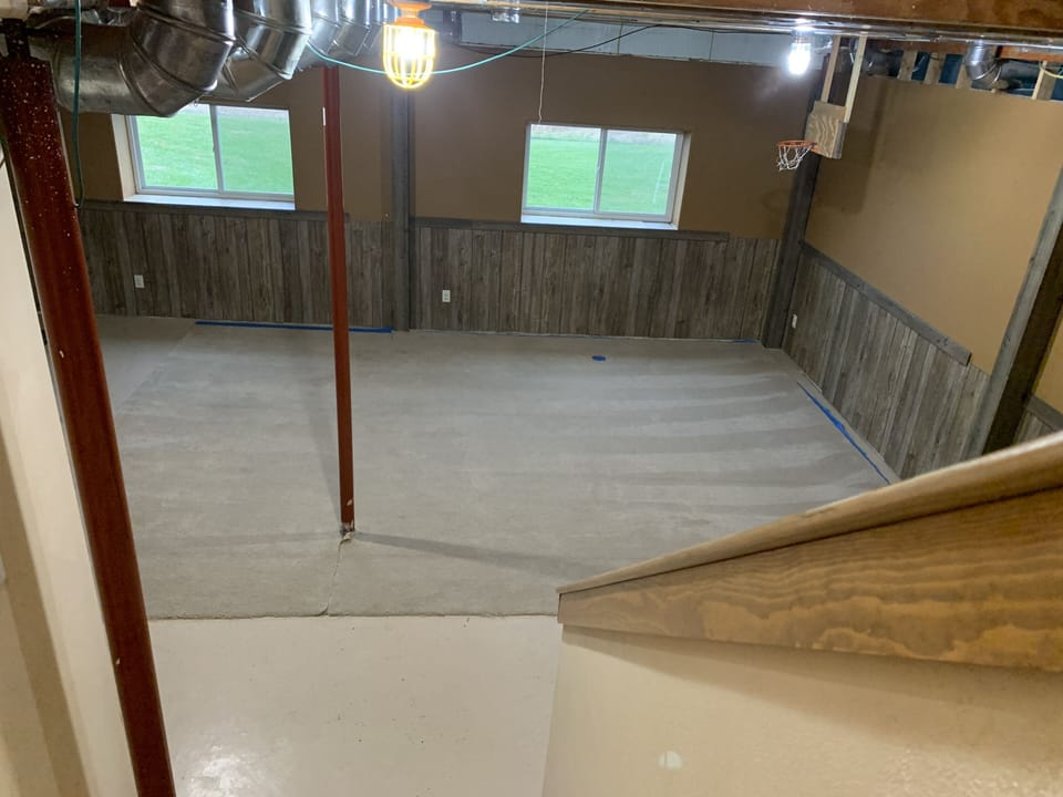 Lower level play area with room for kids to run around and play