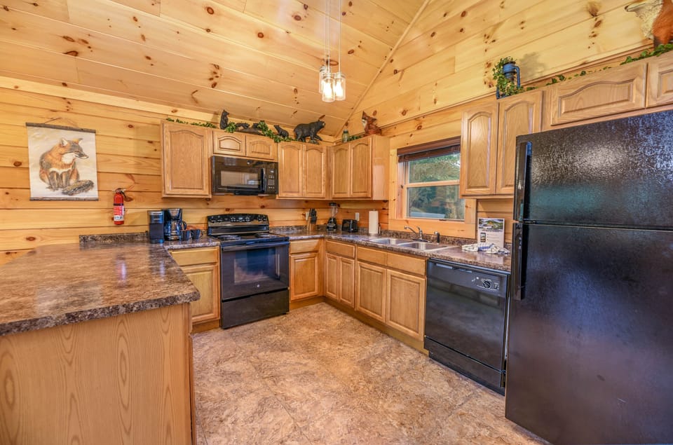 Fully equipped kitchen w/ stainless appliances