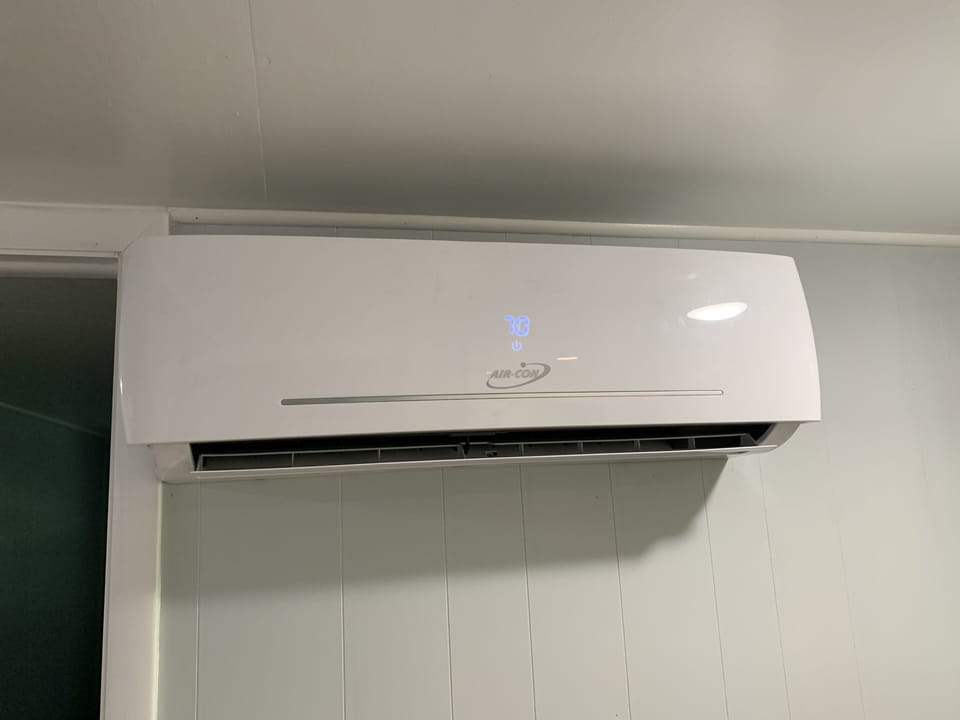 MIni-split. Heating and cooling very efficient and quiet.