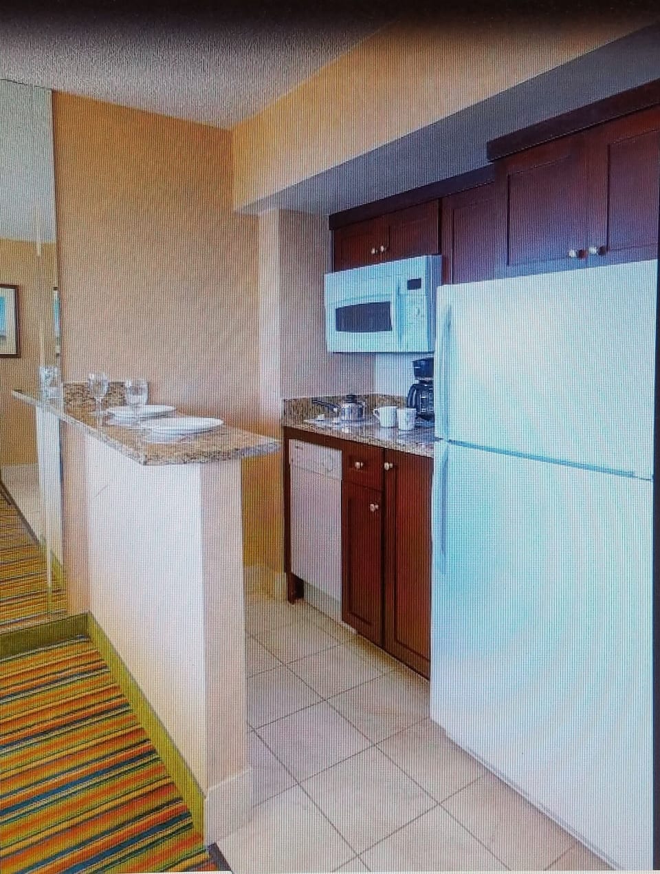 Fully equipped kitchen and kitchenette in master suite