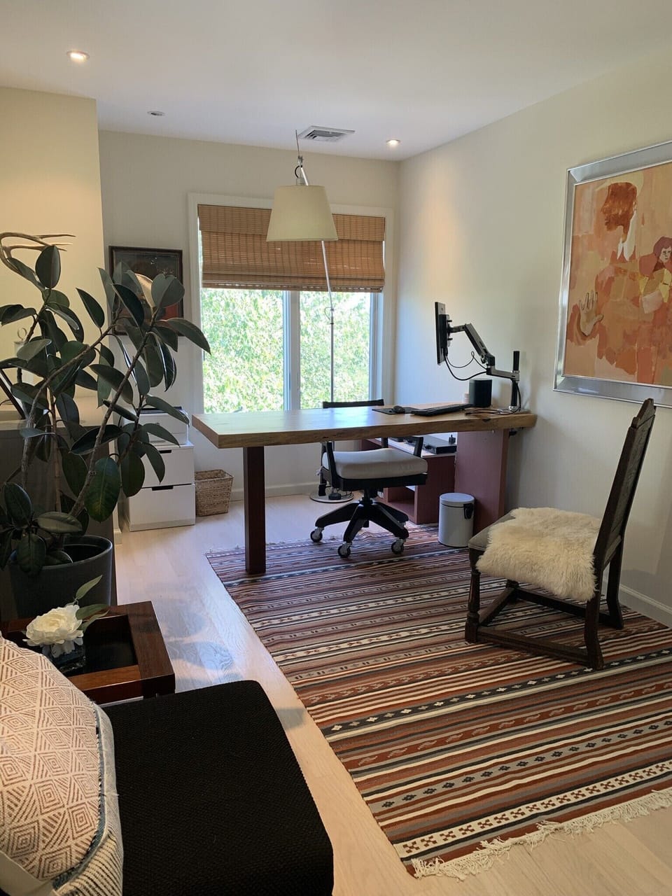 Home Office with electric standing desk and monitor
