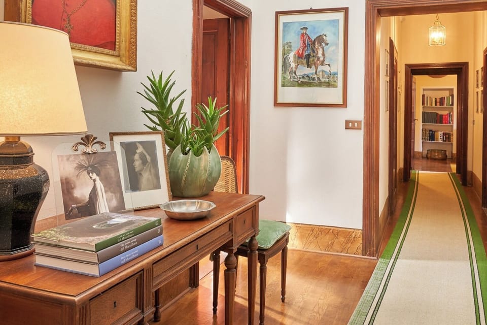 Spacious Corridor on the First Floor Leading to Elegant Suites