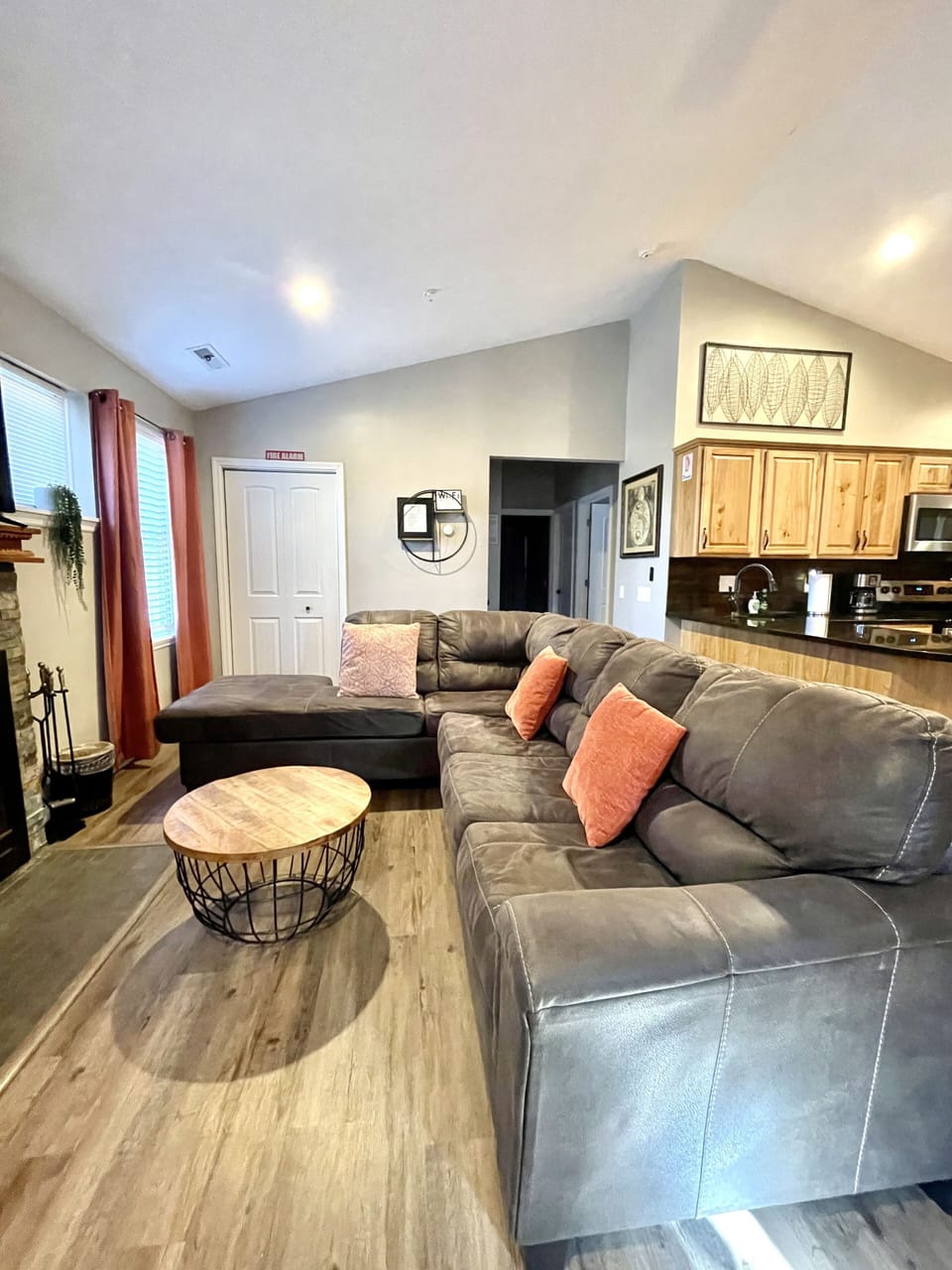 Living room with large couch 
That reclines to the queen size bed