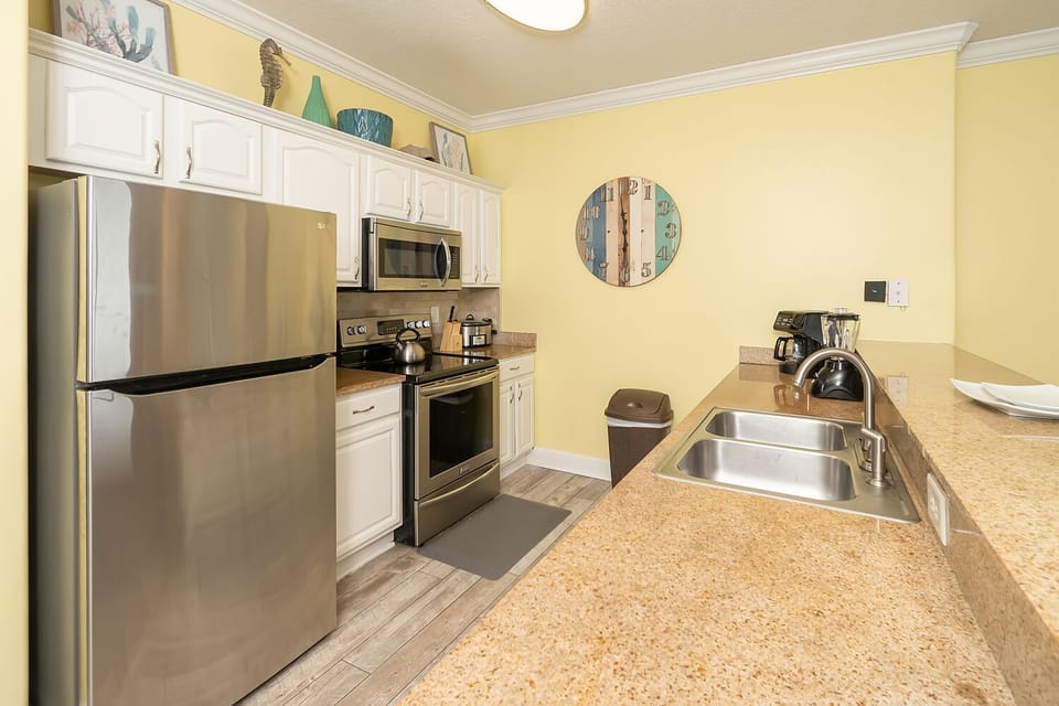 the kitchen is open to the unit so the cook never feels left out of the fun