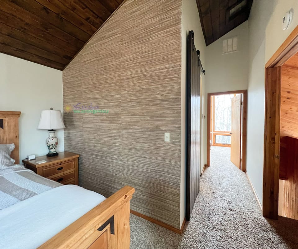 Upstairs bedroom with king bed. - Upstairs bedroom with king bed.
