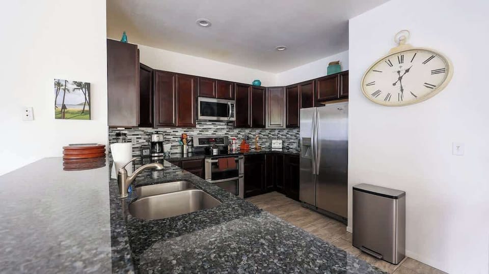 Stainless kitchen with solid surface counters await your creativity!