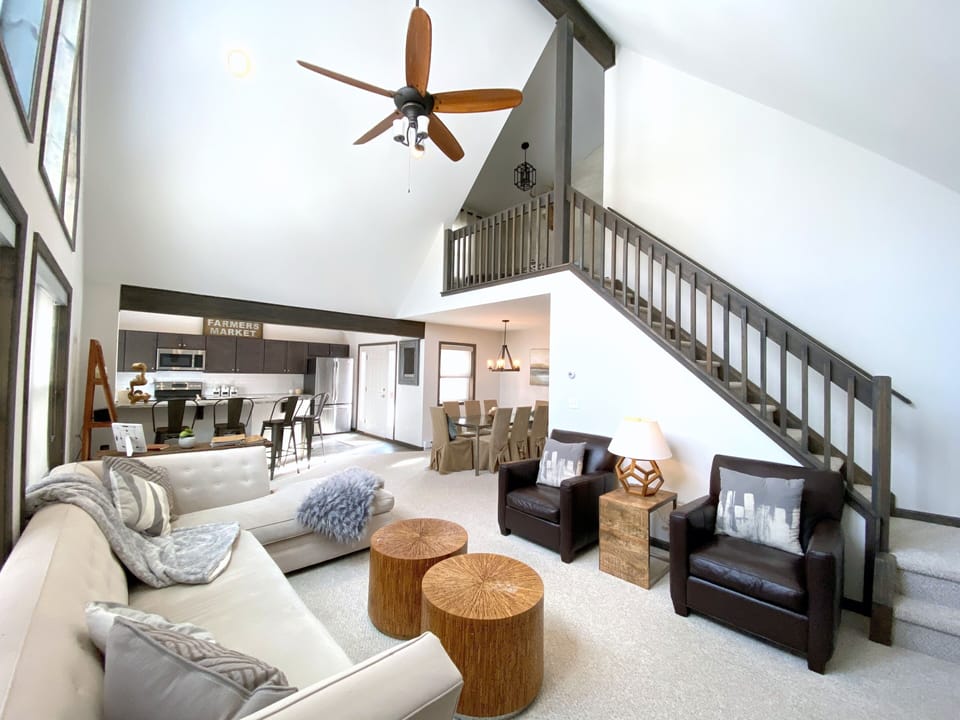 Full view of living room, kitchen and dining area