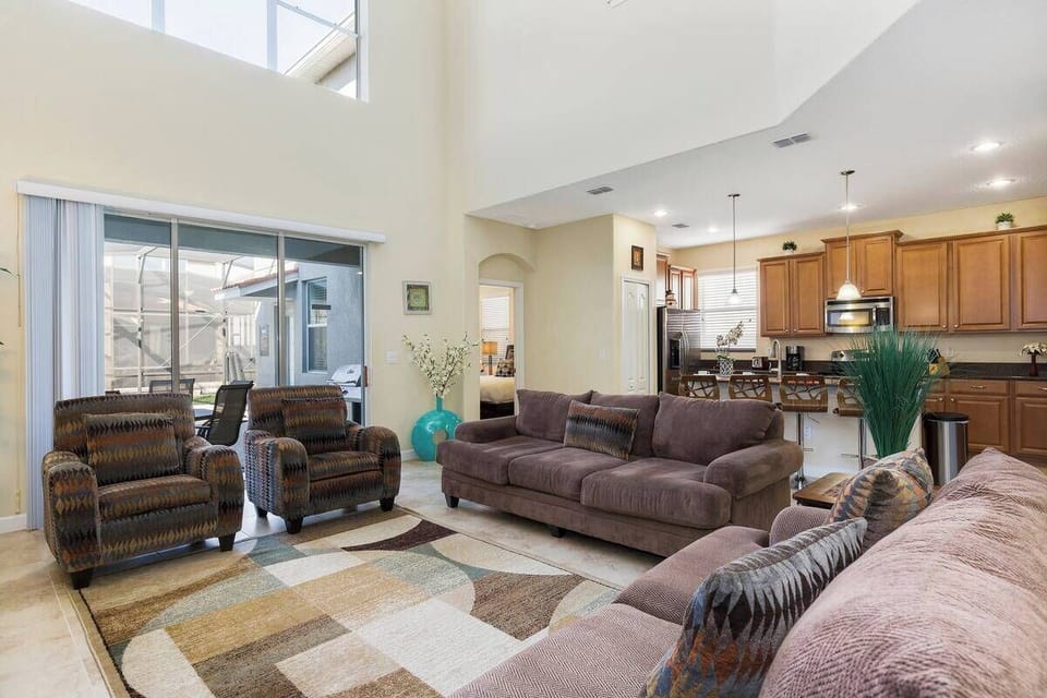 Living Room + kitchen + private patio / swimming pool access