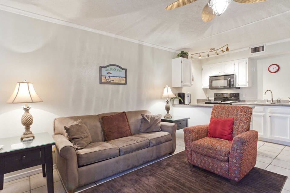Our cozy little corner of paradise feels grand thanks to our open floor plan and sunny windows.