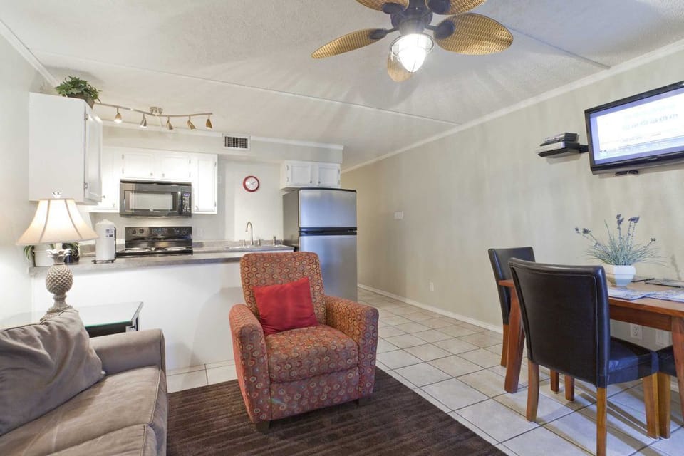 Our adorable little living space seats 4 plus has a dining space nestled nearby.