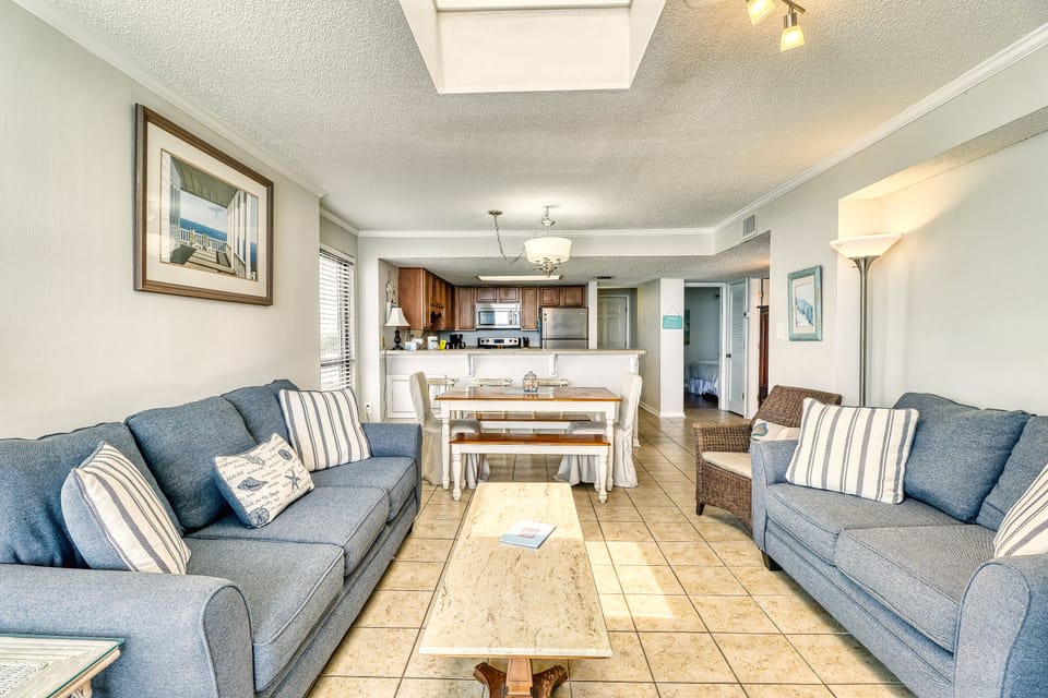 View of living room, dining and kitchen areas 
