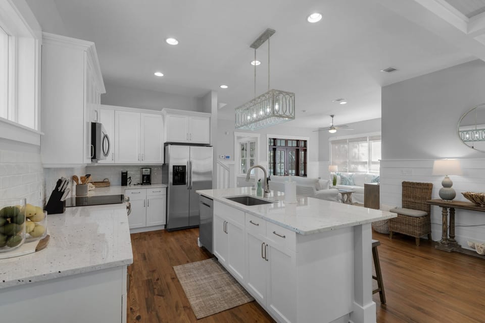 Brand new white kitchen with convection oven, composite sink, fully furnished. 