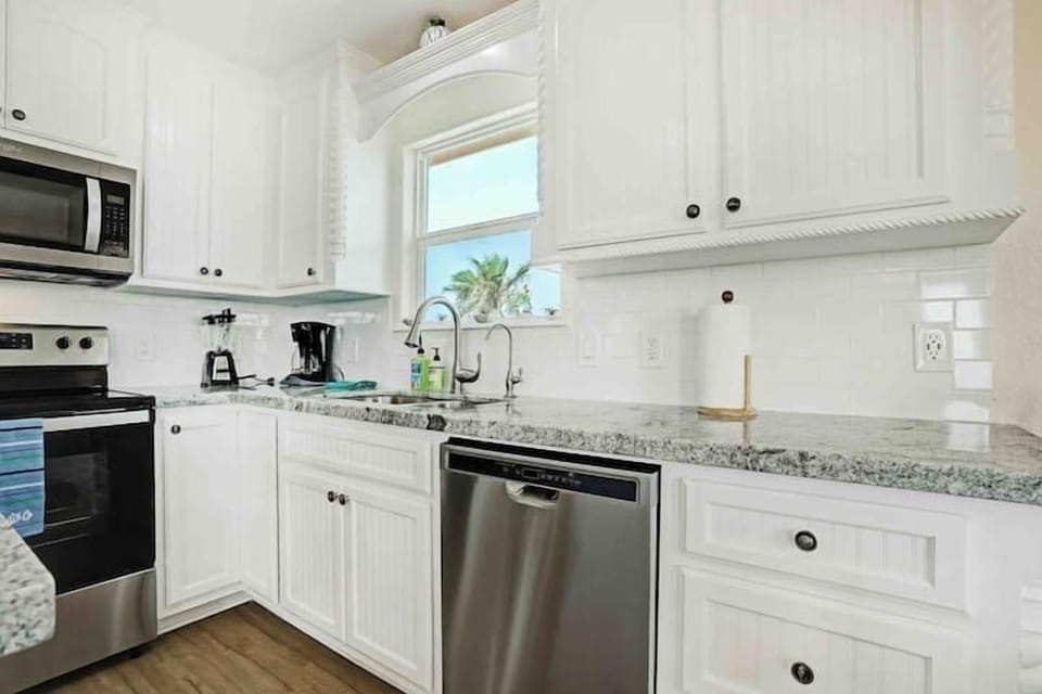 Custom granite counter tops. Coffee maker and blender included