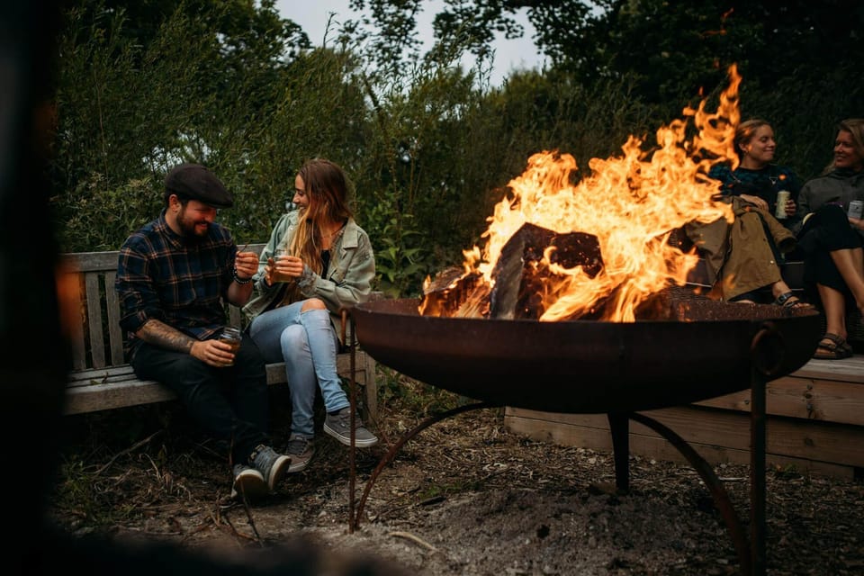 Rowan Yurt has its own outdoor seating area with BBQ/firepit