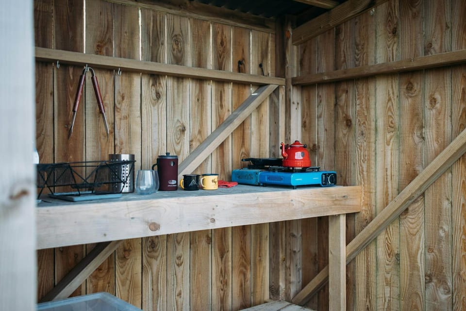Rowan Yurt has its own kitchen shelter and food preparation area