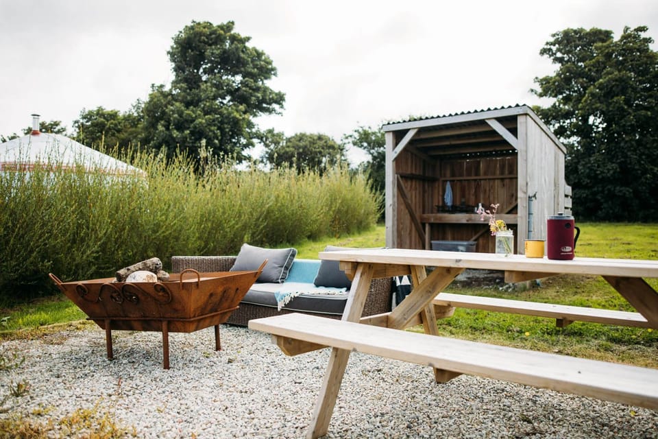 Each Yurt has its own outdoor area with BBQ/firepit, a food preparation area, wood supply and fire lighting equipment