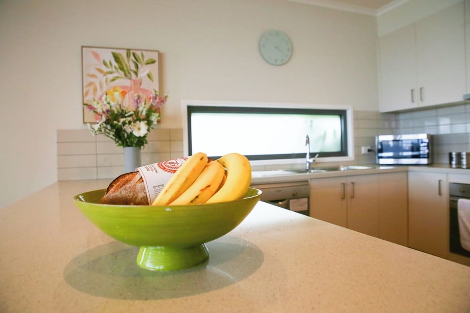 Modern kitchen has plenty of light