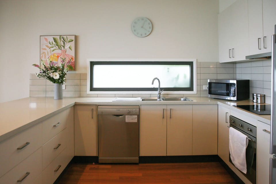 The fully equipped kitchen is large enough for many people to help with meals!
