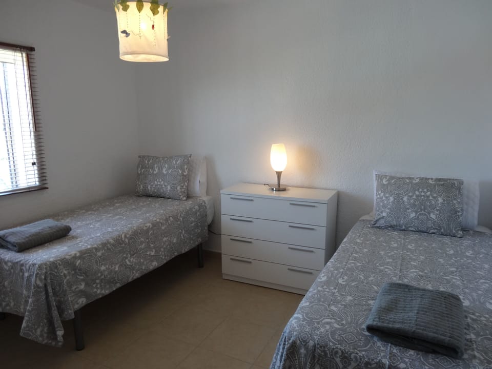 Twin bedroom with a/c