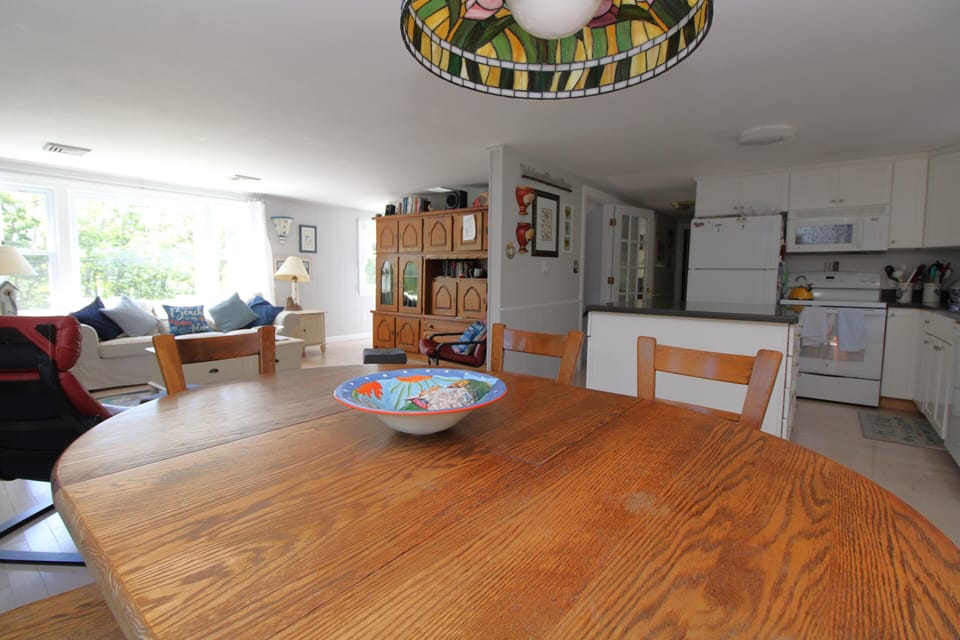 Dining with Kitchen and Family Room in Background
