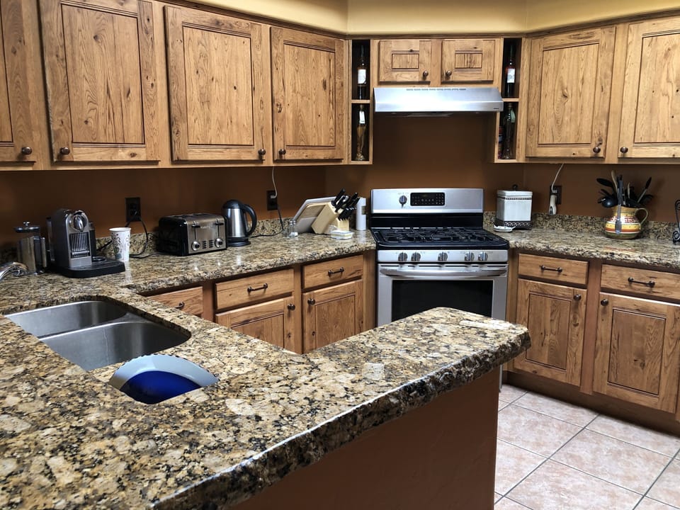 Updated kitchen. Skylight offers lots of natural light to make gourmet meals.