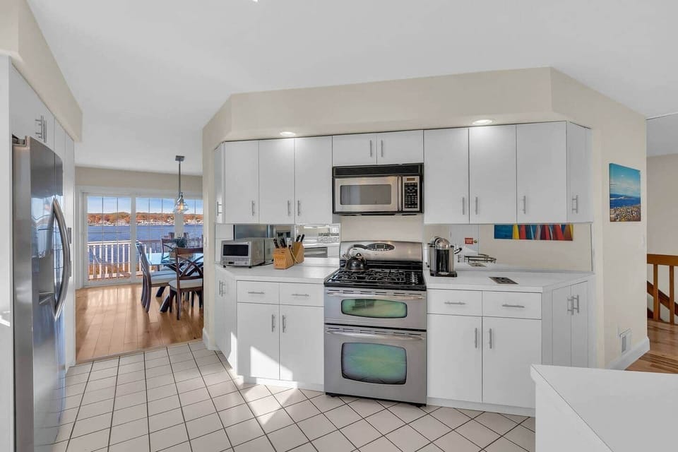 Full Kitchen with cookware and Dishware